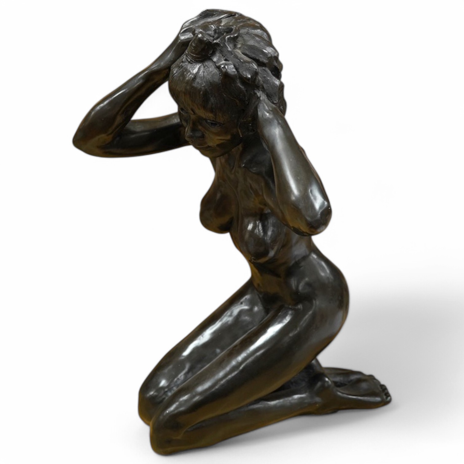 A bronzed composition model of a kneeling female nude, 53cm. Condition - good